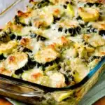 Easy Cheesy Zucchini Bake: Simple, Flavorful & Low-Carb 6 Golden-browned Easy Cheesy Zucchini Bake in a glass dish with bubbling cheese and layered zucchini slices.