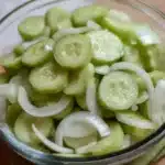 Cucumber and Onion in Vinegar | Quick, Tangy & Easy Pickles 7 Cucumber and Onion in Vinegar served fresh in a glass bowl