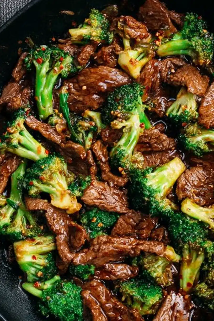 Chinese beef and broccoli stir-fry with garlic soy sauce in a skillet