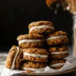 Pumpkin Oatmeal Cream Pies – Amazing Fall Dessert Treat 11 Stack of chewy pumpkin oatmeal cream pies with maple cream cheese filling on a vintage plate