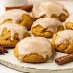 Pumpkin Cookies with Maple Glaze | Simple & Delicious 8 Soft pumpkin cookies with maple glaze topped with glossy icing, styled with cinnamon and star anise on a cozy fall baking tray.