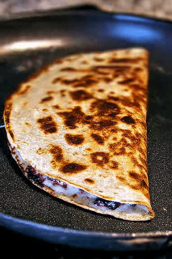 Blueberry Breakfast Quesadilla | Quick & Tasty Morning Win 7 Crispy blueberry breakfast quesadilla cooking in skillet