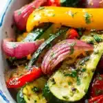 Balsamic Grilled Vegetables – Easy & Flavorful Summer Side 9 Balsamic grilled vegetables with zucchini, peppers, and onions in a white bowl