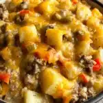 Cheesy Ground Beef and Potato Casserole – Easy & Delicious 8 Cheesy ground beef and potato casserole topped with melted cheddar