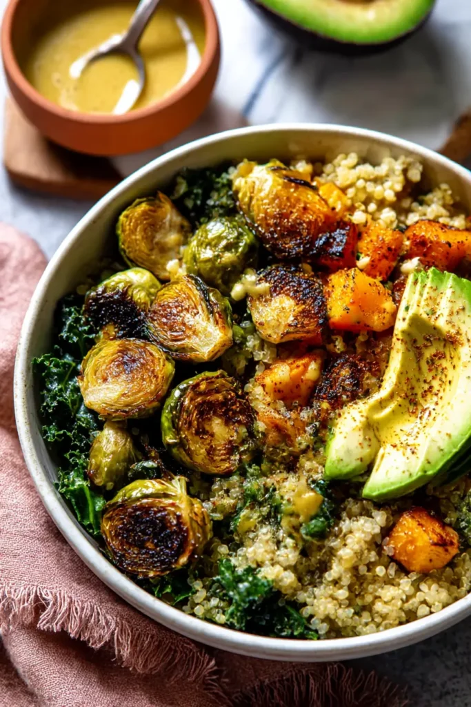 Quinoa and Veggie Power Bowls – Smoky, Sweet & Satisfying 6 Quinoa and Veggie Power Bowls close-up with roasted Brussels sprouts, avocado, squash, and quinoa