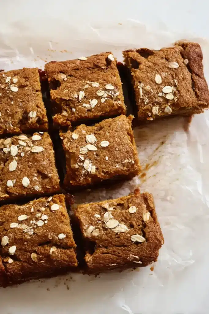 Easy Breakfast Oatmeal Apple Cake – Healthy & Quick Treat 13 easy breakfast oatmeal apple cake topped with oats on parchment