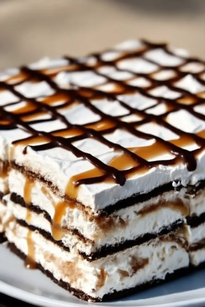 Lazy ice cream sandwich cake with caramel and chocolate grid topping