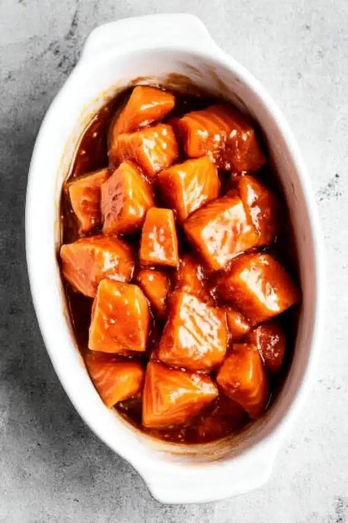 Baked Teriyaki Salmon Recipe with raw salmon cubes marinating in teriyaki sauce