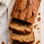 5-Ingredient Spinach Parmesan Zucchini Noodles – Tasty 9 5-Ingredient Spinach Parmesan Zucchini Noodles shown as rustic zucchini bread loaf sliced on a stone surface, highlighting golden crust and moist center