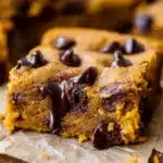 Pumpkin Bars with Chocolate Chips | Easy Fudgy Treat 10 Pumpkin Bars with Chocolate Chips showing gooey center and melty chocolate chips
