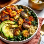 Quinoa and Veggie Power Bowls – Smoky, Sweet & Satisfying 7 Quinoa and Veggie Power Bowls with roasted Brussels sprouts, avocado, butternut squash, and kale in white bowl
