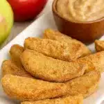 Crispy air fryer apple fries with caramel dip and fresh apples