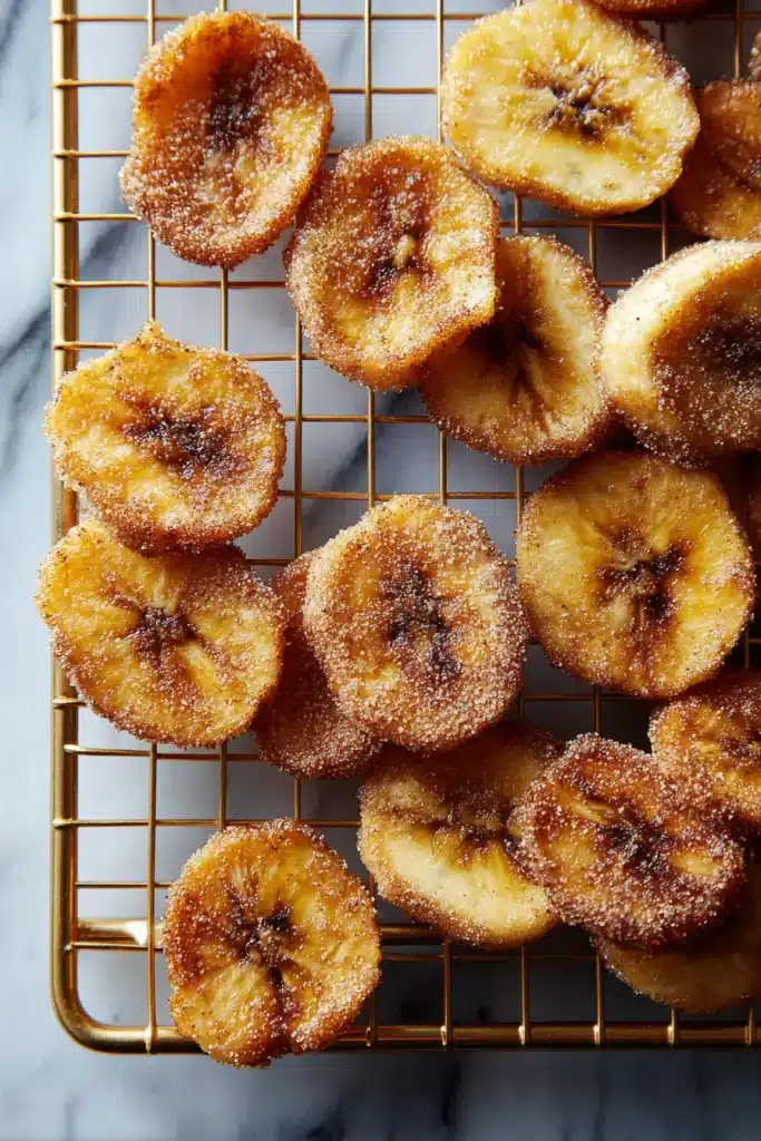 Easy Cinnamon Air Fryer Banana Chips – Quick & Amazing 9 Sweet Cinnamon Air Fryer Banana Chips cooling on rack