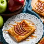 Caramel Apple Puff Pastries with caramel drizzle on a white plate