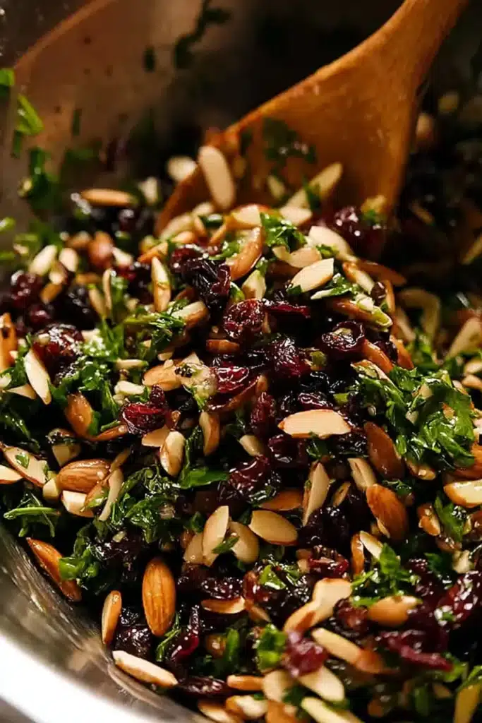 Holiday tapenade with cranberries, almonds, and parsley in a bowl