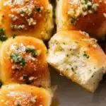 Easy garlic bread rolls brushed with herb butter and sea salt