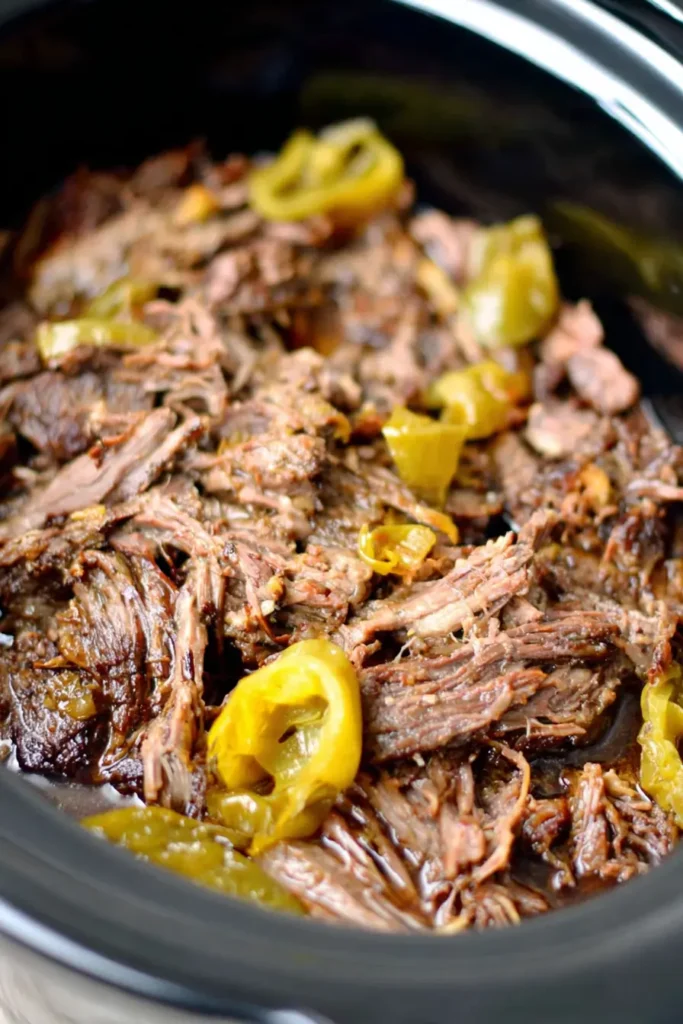 Easy Mississippi Pot Roast served with mashed potatoes and peppers