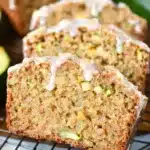 Pineapple Zucchini Bread | Moist & Easy Summer Recipe 7 Close-up of moist pineapple zucchini bread slices with glaze and fresh ingredients