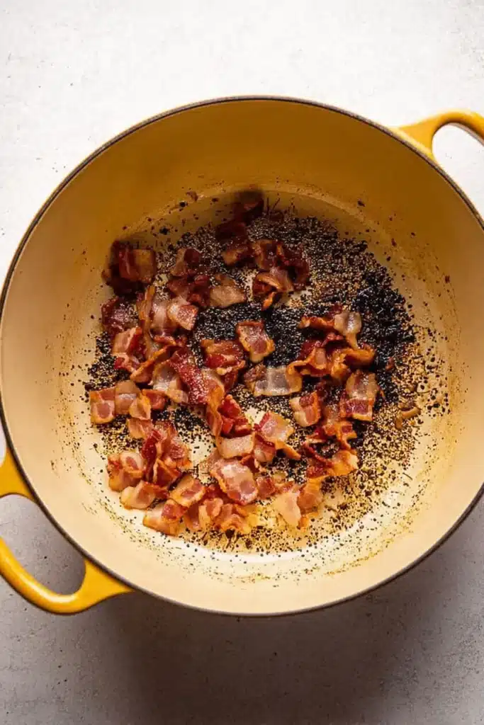 Classic Beef Bourguignon – Cozy, Delicious Holiday Favorite 14 Rendered bacon and fond in Dutch oven for beef bourguignon