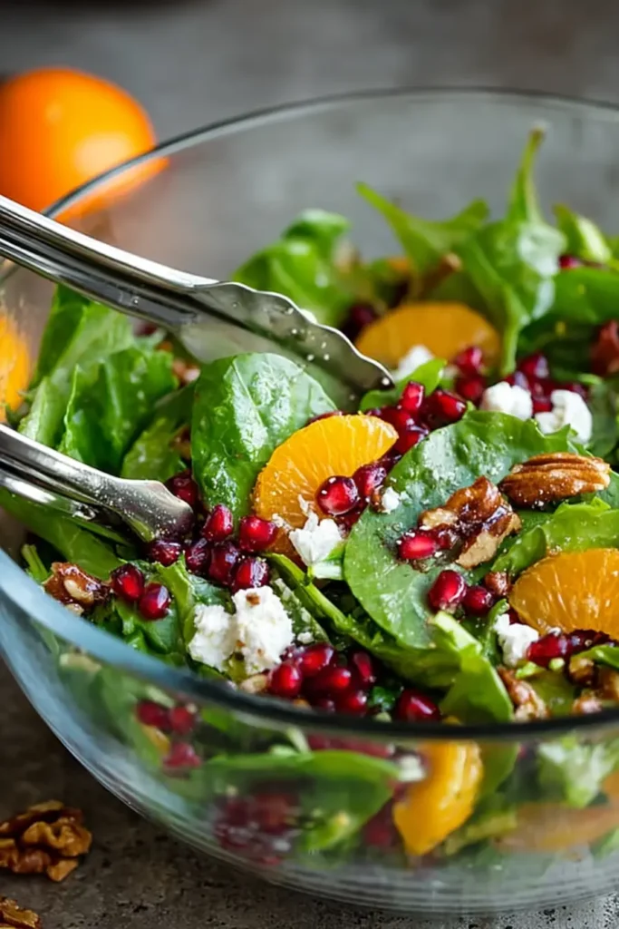 Christmas Salad : A Colorful Holiday Favorite 13 Tossing Christmas Salad Recipe with oranges, pomegranate, feta, and greens