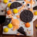 Easy White Chocolate Halloween Bark – Quick & Spooky Treat 10 Easy White Chocolate Halloween Oreo Bark with candy eyes, cookies, and festive sprinkles