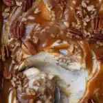 easy caramel apple cheesecake dip with pecans and caramel swirls