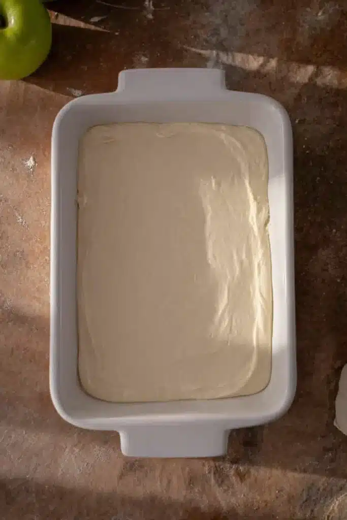 easy caramel apple cheesecake dip recipe base spread in white dish
