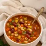 Amazing Minestrone Soup (Olive Garden Copycat) 11 Bowl of minestrone soup with vegetables, beans, and pasta
