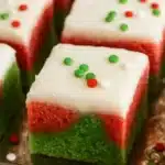 Marble Sugar Cookie Bars – Festive & Easy Holiday Treat 12 Close-up of marble sugar cookie bars with white frosting and sprinkles