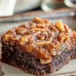 Pecan Pie Brownies with gooey caramelized pecan topping and fudgy chocolate base