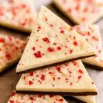 Close-up of salted peppermint bark with crushed peppermint on white and dark chocolate