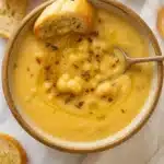 Vegan Garlic Chickpea Soup | Simple, Cozy & Delicious 10 Creamy vegan garlic chickpea soup with olive oil drizzle and crusty bread