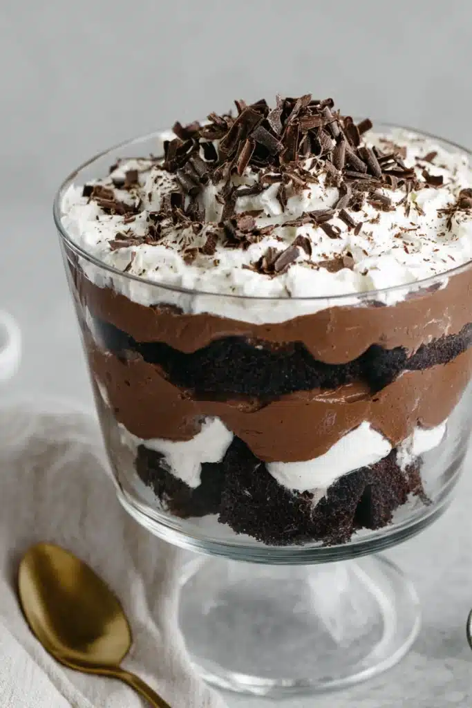 Brownie Trifle Recipe – Decadent, Easy & Wholesome Dessert 7 Close-up of brownie trifle layers with whipped cream and chocolate shavings