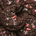 Stacked chocolate peppermint cookies with crushed candy canes