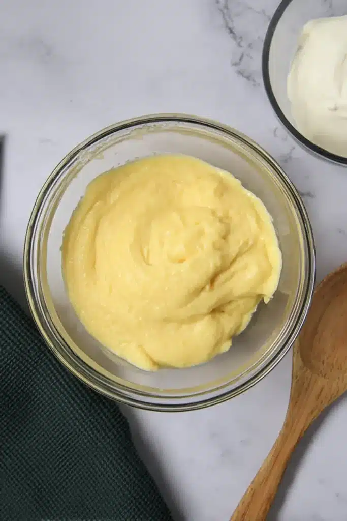 Eggnog Pie Recipe | Creamy, Easy & Irresistible Christmas Dessert 17 Thick eggnog pudding base in a glass bowl for no-bake eggnog pie