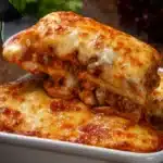 Maggiano’s lasagna slice with melted cheese and meat sauce