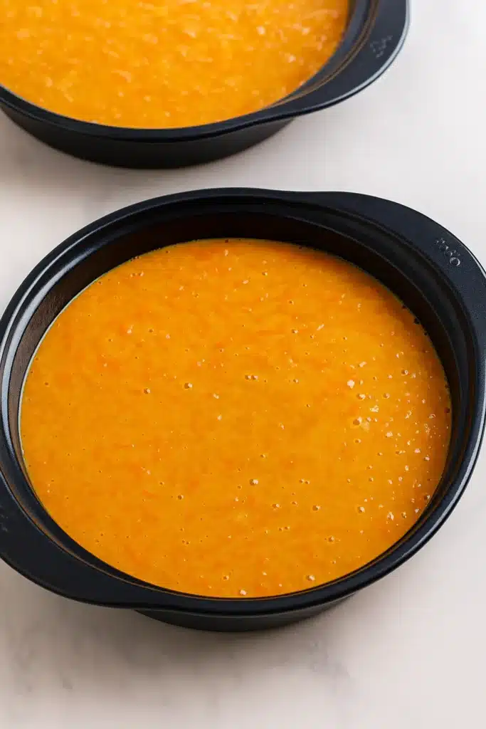 The BEST Carrot Cake Recipe | Irresistibly Moist & Flavorful 27 Carrot cake batter in pans ready to bake for The BEST Carrot Cake