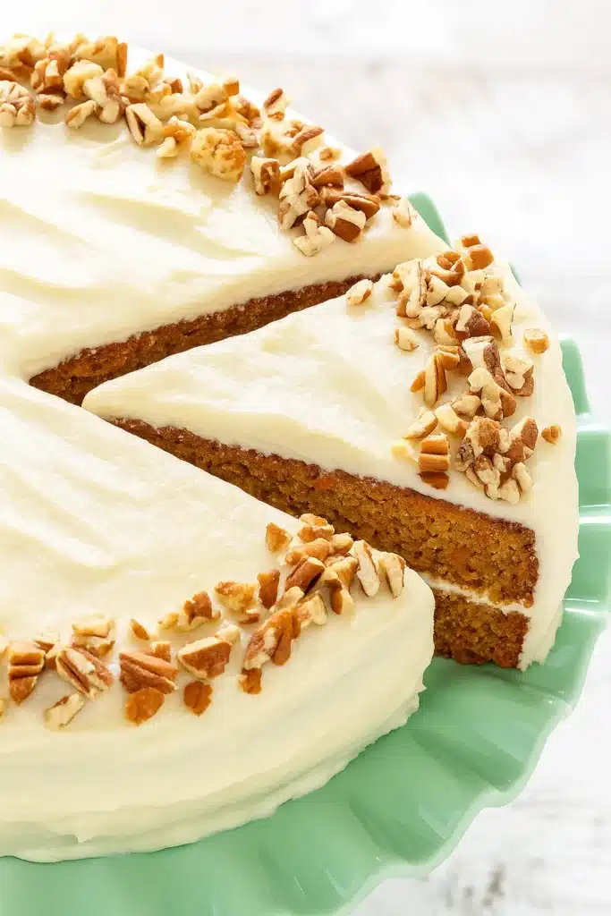 The BEST Carrot Cake Recipe | Irresistibly Moist & Flavorful 31 The BEST Carrot Cake topped with cream cheese frosting and pecans