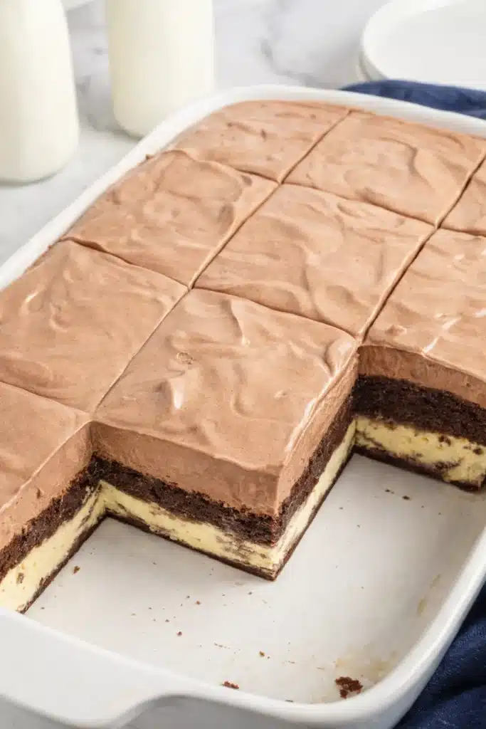 Love Cake Recipe – Irresistibly Creamy & Romantic Dessert 9 Love Cake in white baking dish with chocolate mousse topping and ricotta layers