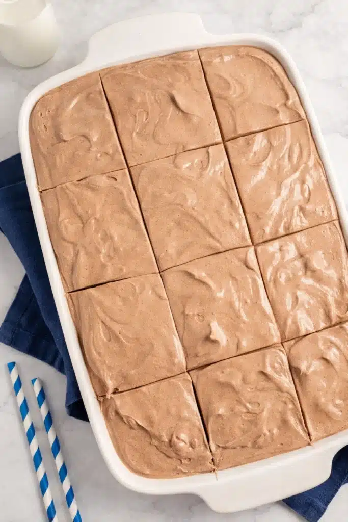 Love Cake Recipe – Irresistibly Creamy & Romantic Dessert 10 Top-down view of chocolate love cake in a white pan with mousse topping