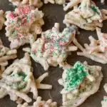 Christmas Haystacks coated in white chocolate with red and green sprinkles