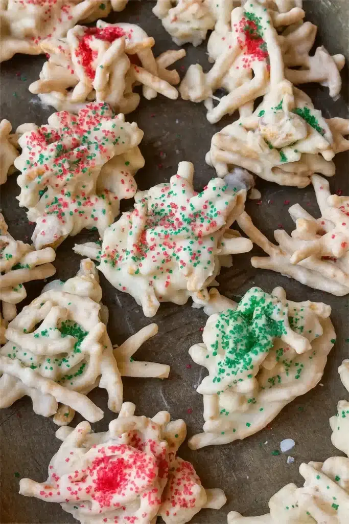Christmas Haystacks coated in white chocolate with red and green sprinkles
