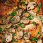 Creamy crock pot chicken marsala with mushrooms and parsley in rich sauce