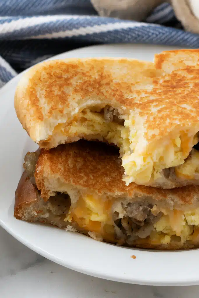 Breakfast grilled cheese sandwich with eggs, cheese, and chicken sausage