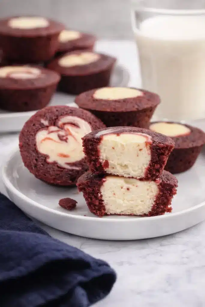 Mini Red Velvet Cheesecakes | Sweet, Creamy, and Irresistible 6 Mini red velvet cheesecakes with creamy cheesecake centers on a plate