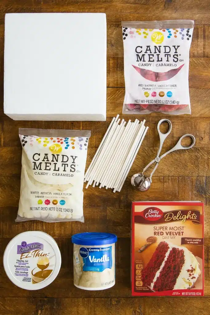 Red Velvet Cake Pops – Easy, Sweet & Irresistible Treats 6 Red velvet cake pop ingredients flat lay on brown wooden table