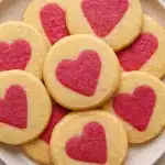 Slice and bake heart cookies with pink centers on a white plate