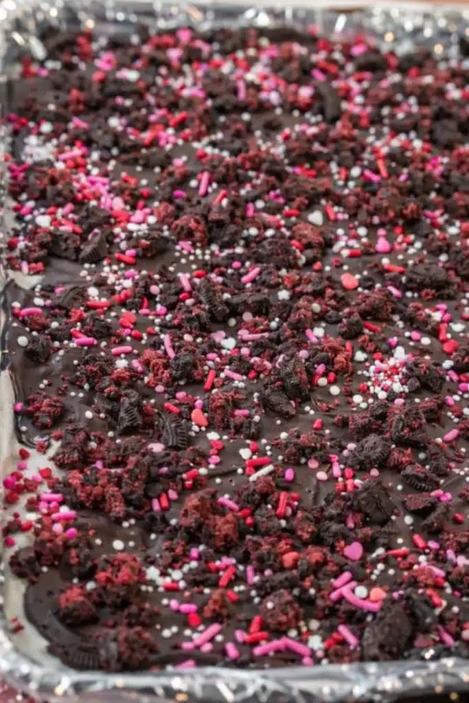 Valentine’s Day Oreo Cookie Bark | Amazing No-Bake Treat 5 Valentine’s Day Oreo cookie bark topped with crushed cookies and red pink sprinkles