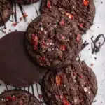 Chocolate covered strawberry cookies with dark chocolate drizzle and strawberry bits