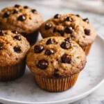 Chocolate chip cottage cheese oatmeal muffins on a white plate